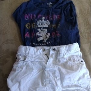 Little girls white childplace skirt with shorts under it and a navy-blue Tommy H